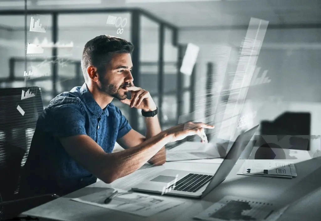 developer sitting on table and working